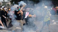 Hong Kong protesters tear-gassed by police as tensions spiral over extradition bill