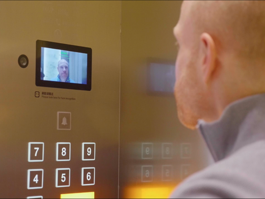 Alibaba's new futuristic hotel, FlyZoo, shows facial recognition software being used to operate an elevator.