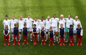 England line up for the national anthem.