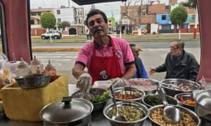 Freddy Alarcón offering a few tips on how to make a great ceviche at the back of his food truck La Combi Roja in Callao, Peru.