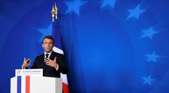 Macron says he warned Iran's Rouhani about breaking nuclear commitments