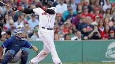FILE PHOTO: Boston Red Sox designated hitter Ortiz follows through as he flies out in eighth inning against the Toronto Blue Jays during their MLB American League East baseball game in Boston