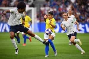 Wendie Renard leaves her mark on Brazil’s forward Debinha.