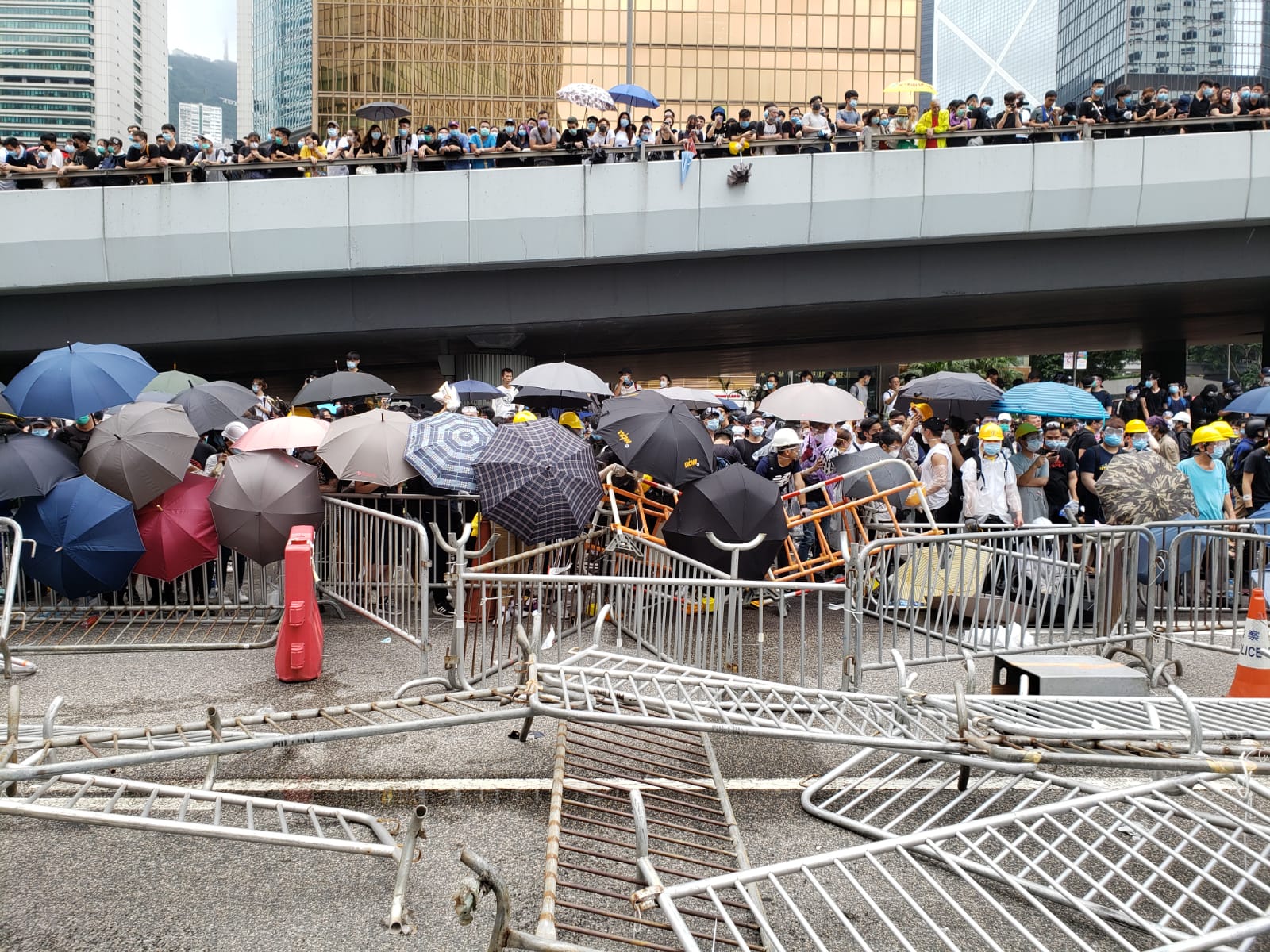 Protesters have erected barricades between them and police. 