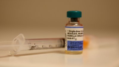 In this photo illustration, a bottle containing a measles vaccine is seen at the Miami Children's Hospital on January 28, 2015 in Miami, Florida. (Creit: Joe Raedle/Getty Images)