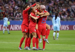 Alex Morgan of the USA celebrates with teammates after scoring her team's twelfth goal during the 2019 FIFA Women's World Cup France group F match between USA and Thailand at Stade Auguste Delaune on June 11, 2019, in Reims, France. (Credit: Robert Cianflone/Getty Images)
