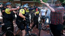 Violent clashes in Portland, Ore., prompt call for anti-mask laws