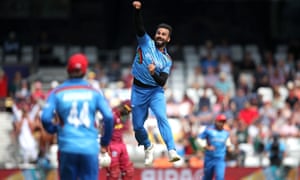 Afghanistan’s Dawlet Zadran celebrates the wicket of West Indies’ Chris Gayle.