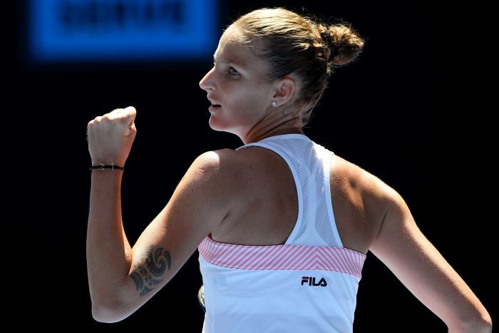 Karolina Pliskova pumps her first during her win over Serena Williams.