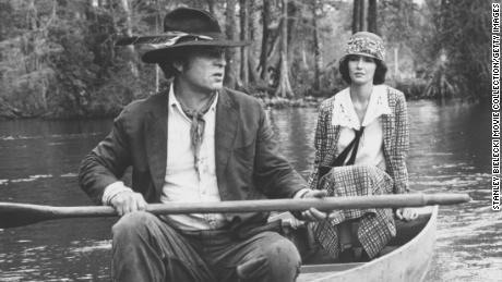 Actors Rip Torn and Mary Steenburgen in a rowing boat, in a scene from the movie &#39;Cross Creek&#39;, 1983.