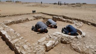 Muslims pray at the site of an ancient mosque in Israel