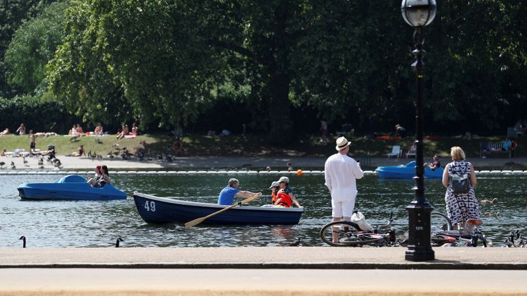 People enjoy the sunshine and warm temperatures in Hyde Park in London, Britain, June 29, 2019. REUTERS/Peter Nicholls