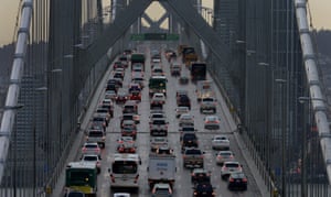 Vehicles make their way westbound on Interstate 80 across the San Francisco-Oakland Bay Bridge.