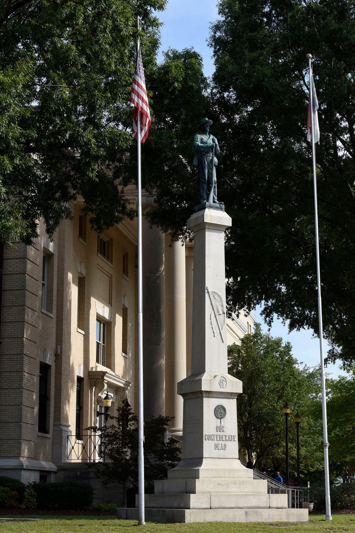A Confederate statue stands outside the courthouse in Greenville, N.C.