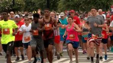 Runners in the AJC Peachtree Road Race