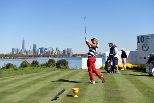 Kevin Chappell of the United States tees off at hole 10 in the final round of the Presidents Cup at the Liberty National Golf Club in Jersey City, NJ on Sunday, October 1, 2017.