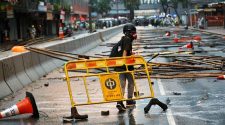 Hong Kong police arrest 36, youngest aged 12, after running battles with protesters