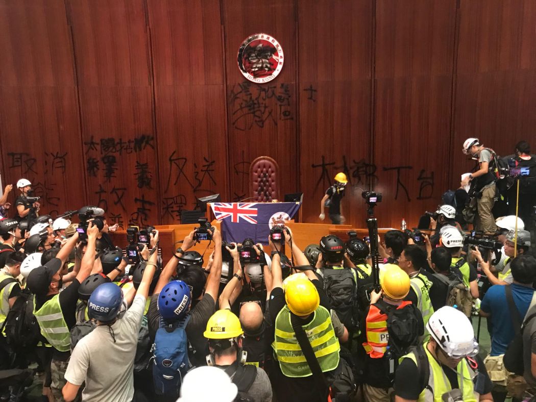 media journalists legco storming july 1 colonial flag