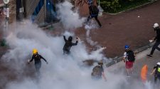 China Warns Hong Kong Protesters Not to ‘Take Restraint for Weakness’