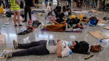 Hong Kong Protesters Apologize After Chaos at Airport