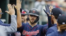 Twins belt six home runs, break record for home runs in a season in loss to Tigers