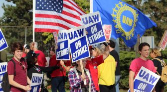 GM reinstates health insurance for striking UAW members