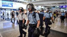 Hong Kong airport faces protests after night of violence