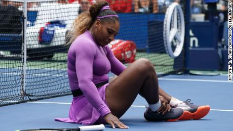 Serena Williams advances to US Open quarterfinals but injures her ankle