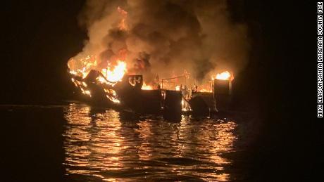 Flames blocked escape routes on boat and trapped sleeping divers, official says. 33 bodies have been found