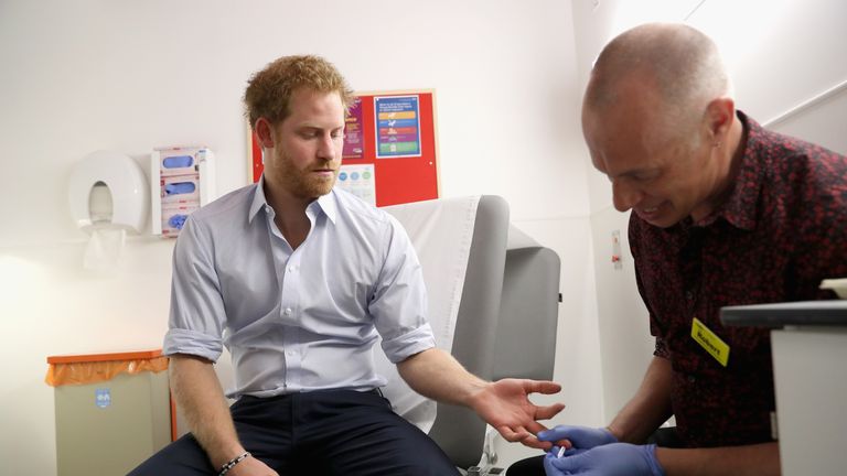 LONDON, ENGLAND - JULY 14:  Prince Harry has blood taken by Specialist Psychotherapist Robert Palmer as he takes an HIV test during a visit to Burrell Street Sexual Health Clinic on July 14, 2016 in London, England. Prince Harry was visiting the clinic, run by Guy's and St Thomas NHS Foundation to promote the importance of getting tested for HIV and other STDs.  (Photo by Chris Jackson/Getty Images)