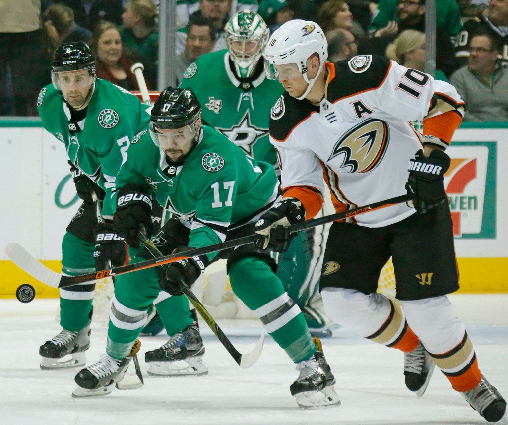 Dallas Stars center Devin Shore (17) and Anaheim Ducks right wing Corey Perry (10) chase the puck in the first period during the Anaheim Ducks vs. the Dallas Stars NHL hockey game at the American Airlines Center in Dallas on Friday, March 9, 2018. (Louis DeLuca/The Dallas Morning News)