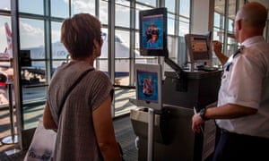 A woman boarding a SAS flight to Copenhagen goes through facial recognition verification system in Virginia in 2018.