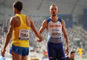 Bosnia and Herzegovina’s Amel Tuka shakes hands with Britain’s Kyle Langford.