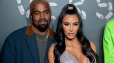 Kanye West and Kim Kardashian West attend the the Versace fall 2019 fashion show.