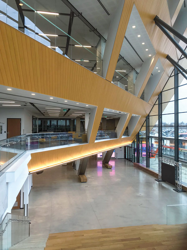 A view of the lobby space in the Barrett Centre looking towards the collaborative break out spaces incorporated in the building along its mezzanine edges.