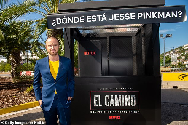 Photocall: Aaron posed in front of a booth which had the words 'Where is Jesse Pinkman' written across the front in Spanish
