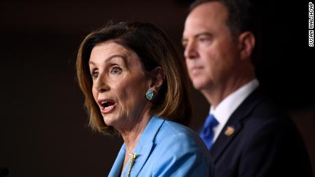 House Speaker Nancy Pelosi, joined by House Intelligence Committee Chairman Rep. Adam Schiff, speaks during a news conference on Capitol Hill in Washington, October 2.
