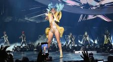 Lady Gaga falls off stage in fan's arms at Las Vegas Enigma show