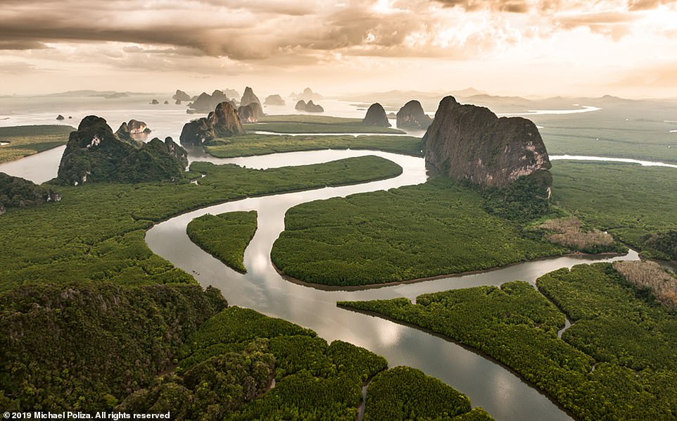 The mangrove forests of Phang Nga Bay in Thailand. Michael said: 'My eye has always been drawn to nature and remote places'