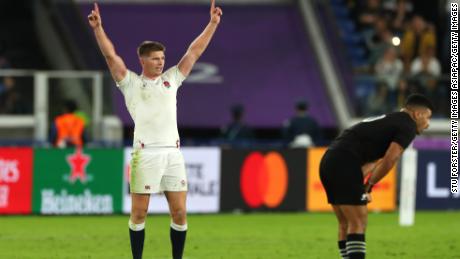Owen Farrell celebrates after England score a try.