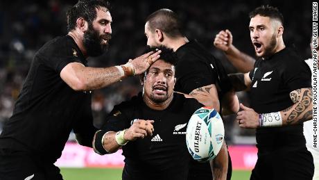 New Zealand&#39;s flanker Ardie Savea is congratulated by teammates after scoring his second half try which briefly boosted the All Blacks. 