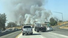 Crews battle fast-moving brush fire just outside L.A. hours after blaze tears through mobile home park