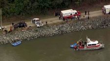 Driver dies trying to rescue passengers from submerged car; two others found dead
