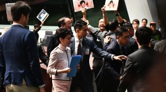 Hong Kong leader Carrie Lam's policy speech interrupted by lawmakers
