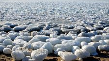 Bizarre, Beautiful Balls Of Ice Are Washing Up Around The World