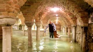 The flooded crypt of St Mark's Basilica is pictured during exceptionally high water levels in Venice, Italy, 13 November 2019