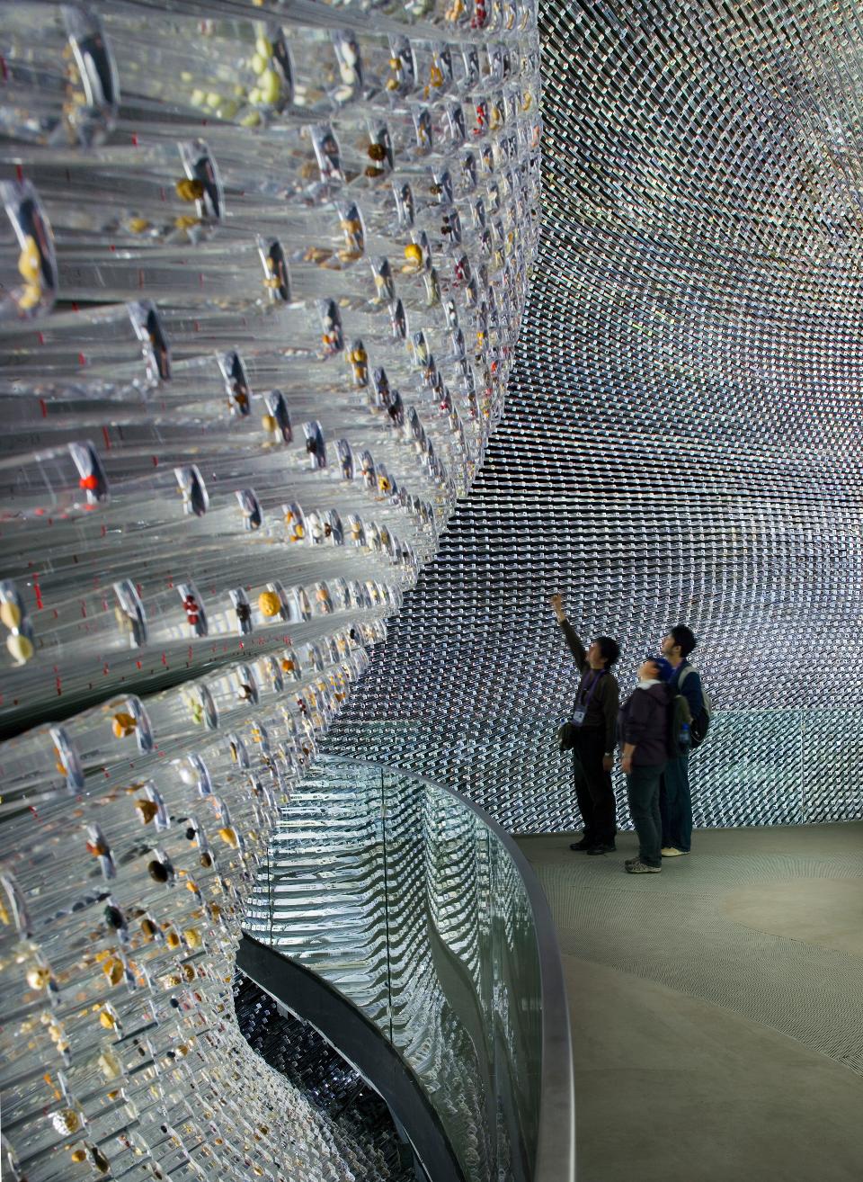 Shanghai Expo 2010 Uk PavilionShanghaiChina Architect:  Thomas Heatherwick Studio 2010 'Seed Cathedral', Uk Pavilion, Thomas Heatherwick Studio, Shanghai Expo 2010, China Interior View Showing Visitors Observing The Seeds Encased In The Tips Of T