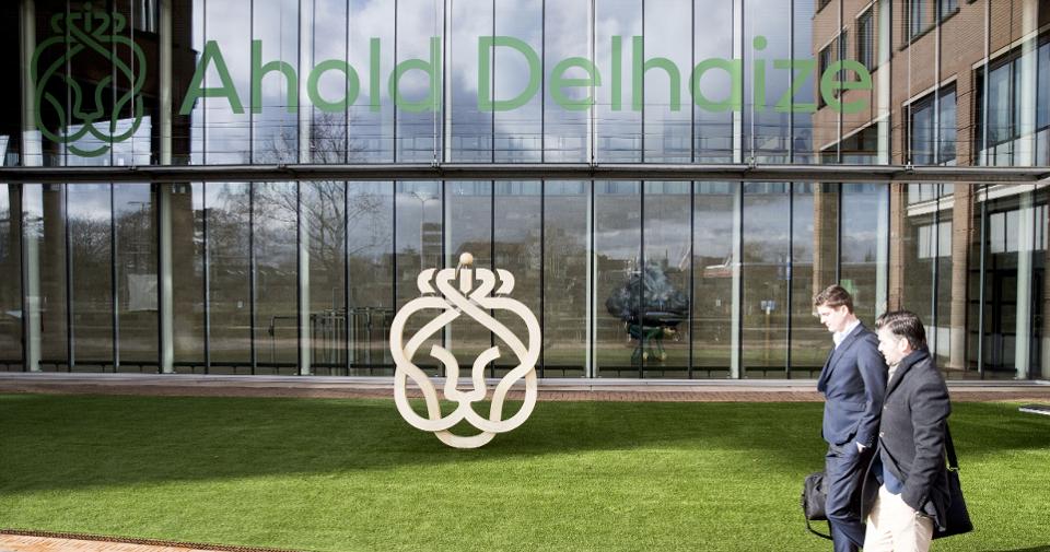 People walk in front of the headquarters of Ahold Delhaize. 