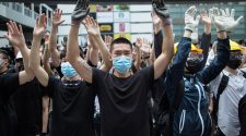 Protesters in Hong Kong covering their face to avoid facial recognition. Photo: EPA