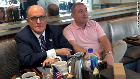 Rudy Giuliani has coffee with Lev Parnas at the Trump International Hotel in Washington, in September 2019.  